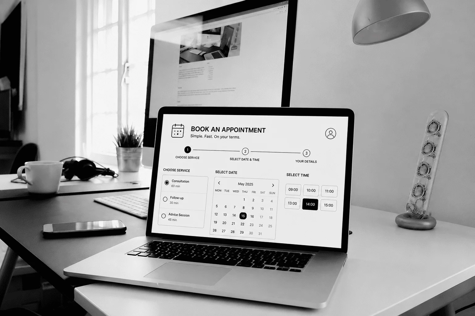 Laptop displaying online appointment booking page on office desk